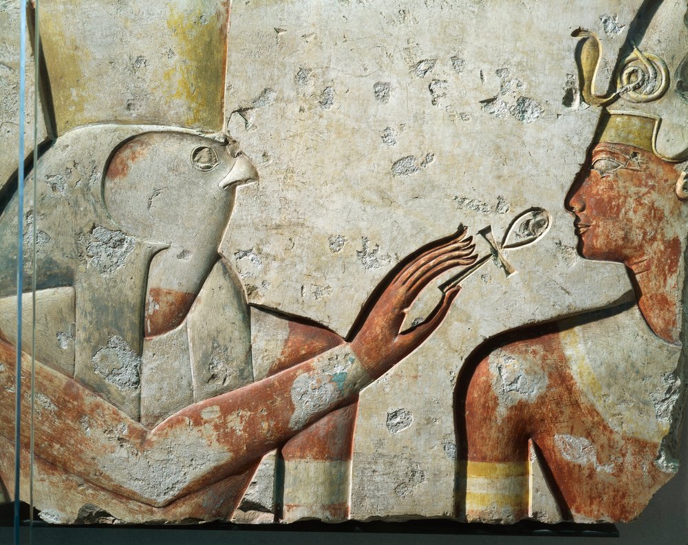 Horus presenting the ankh, the breath of life, to the king: a sacred image of the Opened Mouth